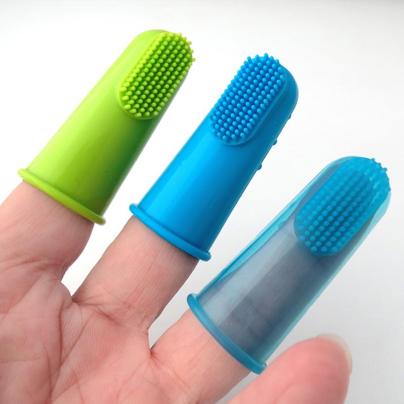 Finger toothbrushes worn on fingers